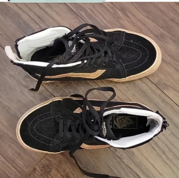 Kids gold and blackVan's size 2
